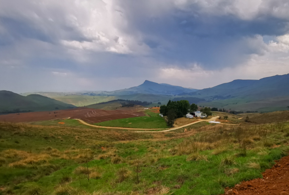 The valley of the upper uMngeni River before a storm